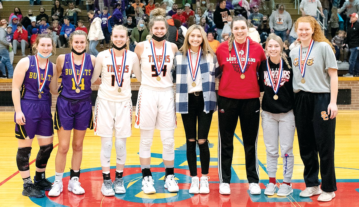 Eight players from six teams were honored with a spot on the all-tournament team at the conclusion of the girls' side of this year's Carlinville Holiday Tournament. From the left are Madison Roberts and Tylie Barton of Williamsville, Alexis Pohlman and Kylie Kinser of Greenfield-Northwestern, Jill Stayton of Carlinville, Audrey Sabol of Nokomis, Jaeylyn Hill of Calhoun and Kenna Bixby of South County.